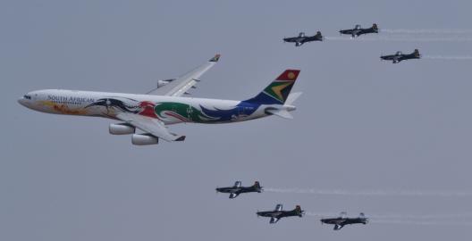 Airbus A340-313X  with the Silver Falcons PC-7 Astra